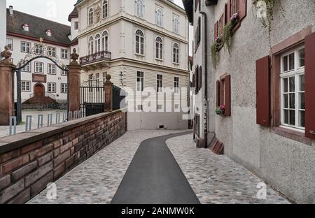 Empty Alley Amidst Buildings In City Stock Photo