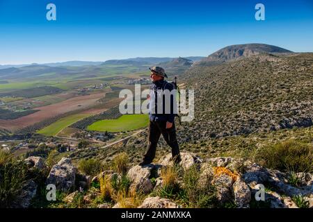 Hiker doing a nature walk. Nature environment natural park of Ardales. Malaga province, southern Andalusia. Spain Europe Stock Photo