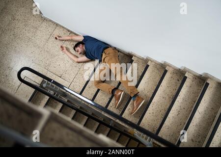 Unconscious Man Lying On Staircase After Slip And Fall Accident Stock ...