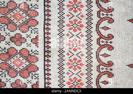 cotton fabric woven canvas texture with a pattern of ornament on a light background. Country style. Stock Photo