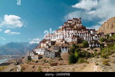 View of the ancient Key Monastery flanked by the high Himalayas and the Spiti river and valley on a summer's day near Kaza, Himachal Pradesh, India. Stock Photo