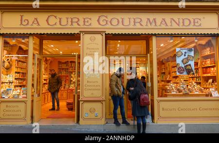 La Cure Gourmande looks like an old-fashioned confectionery store.It located in Motmartre district , Paris, France. Stock Photo
