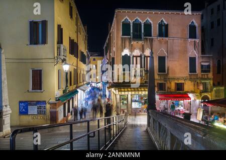 Venice, Italy - Sep 30, 2018: Night view from the delle Guglie bridge to Salizada S. Geremia Stock Photo