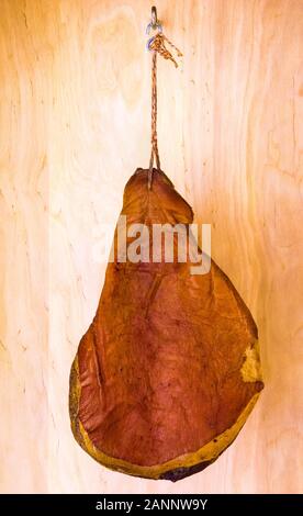 Serrano ham shown hanging on Stock Photo