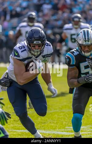 Seattle, Washington, USA. 23rd Sep, 2018. Seattle's NICK VANNETT (81) and  the Cowboys EZEKIEL ELLIOTT (21) get ready to trade jerseys after the  Seahawks beat the Cowboys 24-13 in a NFL game