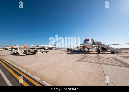 Region de Murcia International Airport, Corvera, Costa Calida, Spain, Europe. Busy with easyJet and Ryanair jet airliner planes. Ground equipment