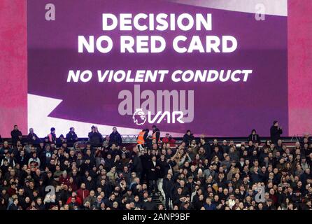 In-stadium screen displays “Checking Penalty” during a VAR review at ...