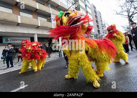 Participants perform the lion dance during the Chinese New Year Parade in Lisbon.Chinese communities around the world celebrate the Chinese New Year 2020, the year of the rat. In Chinese culture, rats were seen as a sign of wealth and surplus. Stock Photo