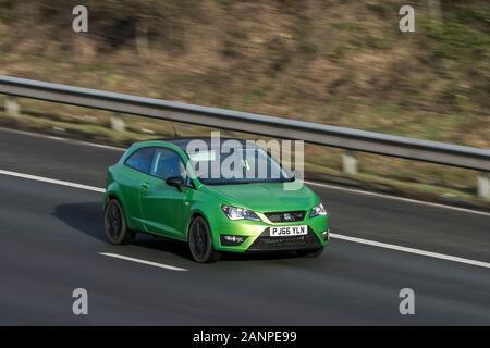 2016 Seat Ibiza Fr Technology Tsi car green Petrol driving on the M6 motorway near Preston in Lancashire, UK Stock Photo