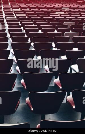 Red seats inside the Beijing National Stadium or Bird's Nest designed by architects Herzog & de Meuron Stock Photo