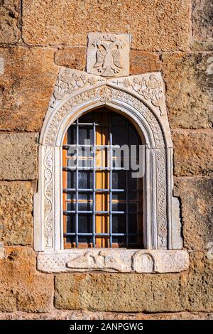 Marble decoration on a window surround in the church of Agios Spyridon at the  Mourtzinos/Petreas complex in Old/upper Kardamyli,  Outer Mani, Messini Stock Photo