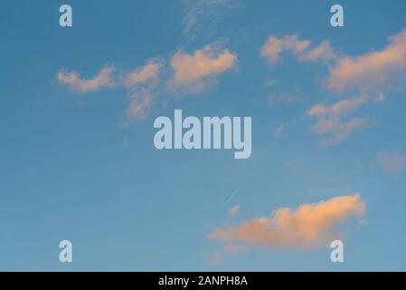 Colorful sunset sky background with reddish colors Stock Photo