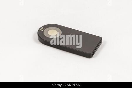 Small black unbranded remote control for DSLR camera, isolated on a white background Stock Photo