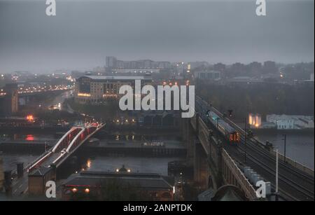 Arriva Northern Rail class 156 sprinter train crossing the Newcastle High level bridge over the river Tyne