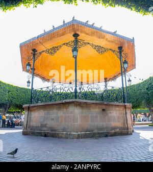 Celaya, Guanajuato, Mexico - November 24, 2019: People resting at the Kiosk at the Plaza de Armas in Celaya Stock Photo