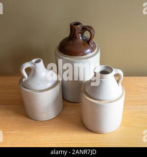 A group of three antique pottery jugs Stock Photo