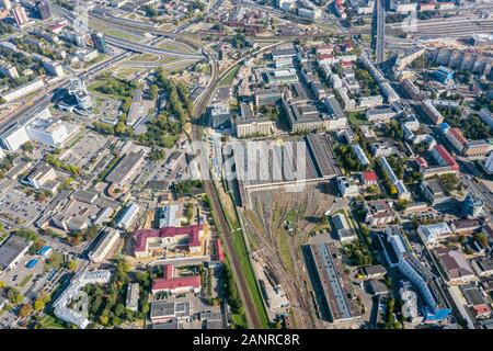 panoramic view of urban industrial district with railroad, train depot and freight trains. Minsk, Belarus Stock Photo