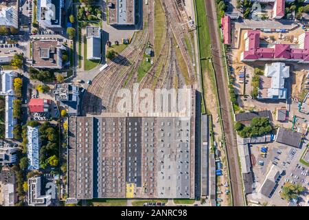 tube train depot in industrial district. aerial photo from flying drone
