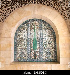 Armenian ceramics room in the Jerusalem House of Quality created about 1925 by David Ohannessian.  Cypress tree mosaic design on tiled panel. Stock Photo