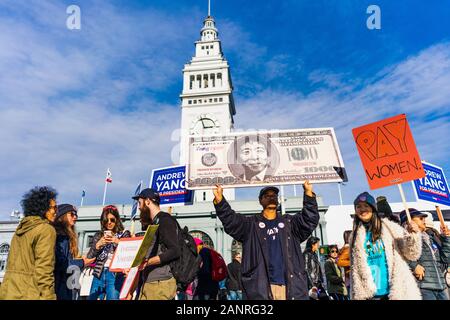 Jan 18, 2020 San Francisco / CA / USA - Signs raised by an Andrew Yang supporters participating at the Women's March in downtown San Francisco Stock Photo