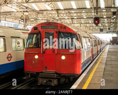 Tube train on The Bakerloo Line at Queens Park station in London. Stock Photo