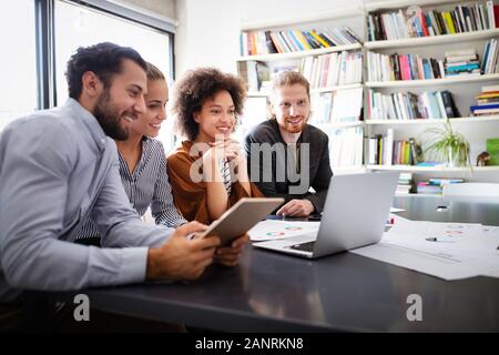 Software engineers working on project and programming in company Stock Photo