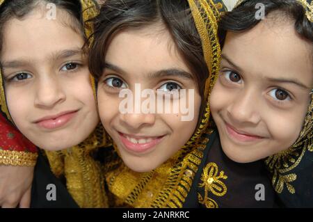 Arabic culture, group portrait  qatari girls in traditional dress. Stock Photo