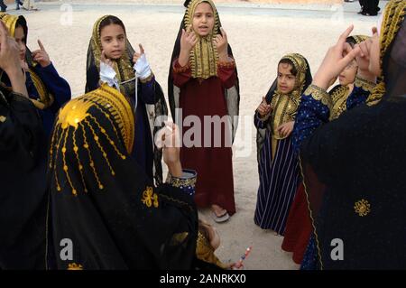 Cultural Festival, group of qatari girls in traditional dress Stock