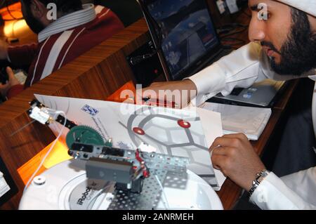 Qatar Foundation University. Qatari Student building a robot for the botball competition. Stock Photo