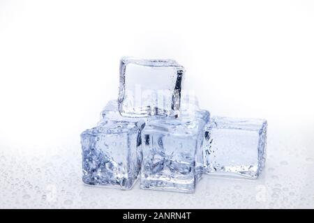 Ice cubes square with drops water clean on white background Stock Photo