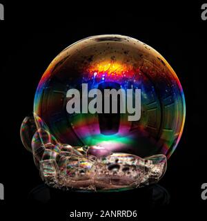 A bubble made from water and washing up liquid. Stock Photo