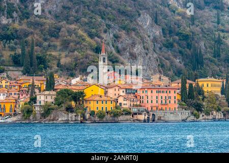 Evening view city Bellagio and Varenna Como water lake Italy blue sky mountain Stock Photo