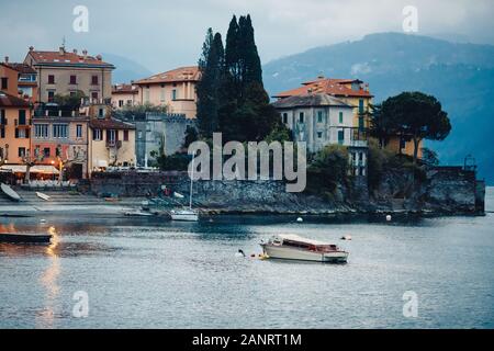 Evening view city Bellagio and Varenna Como water lake Italy blue sky mountain Stock Photo