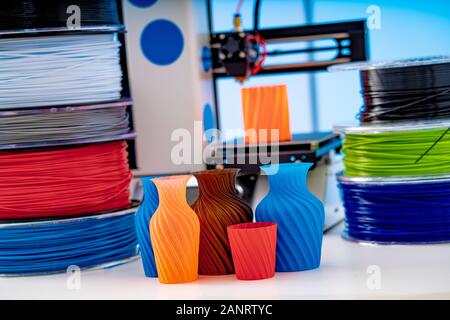 3D Printer Plastic filament for 3D printer and printed products in the interior of the design office Stock Photo