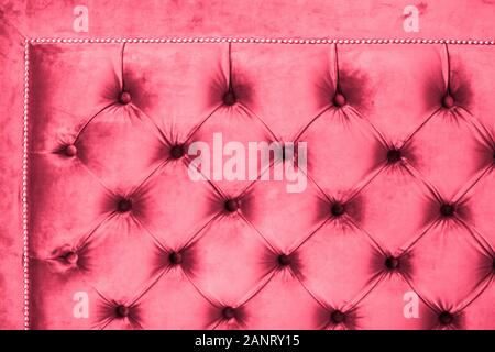 Furniture design, classic interior and royal vintage material concept - Pink luxury velour quilted sofa upholstery with buttons, elegant home decor te Stock Photo