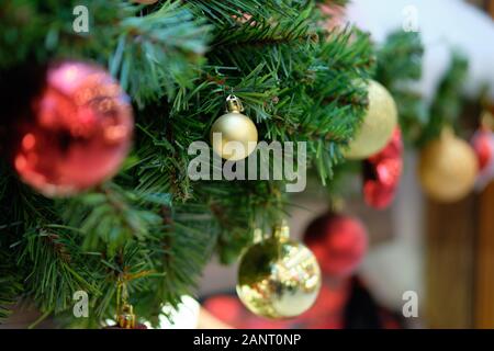 Christmas decorations colored balloons branch. CLose up. Stock Photo