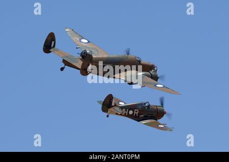 Lockheed Hudson twin engine light bomber and coastal reconnaissance aircraft flying in formation with Commonwealth Aircraft Corporation Boomerang figh Stock Photo