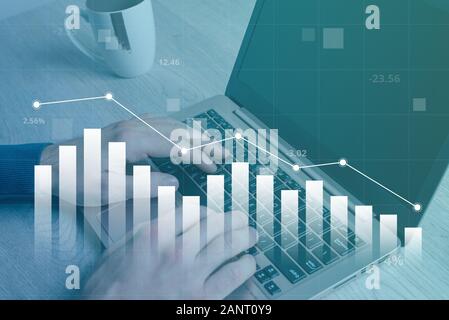 Decline in the value of the market, economy and business shown in the chart. Concept of working on a laptop computer in background Stock Photo