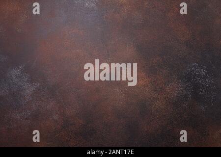 Brown rusty metal texture or old stone wall background Stock Photo