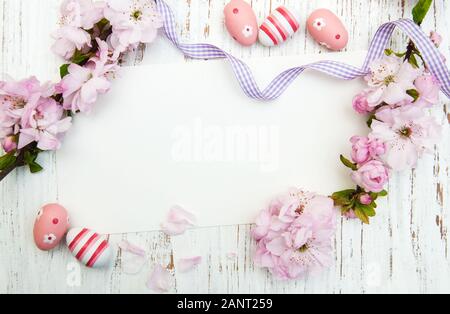 Easter greeting card with cherries blossom and eggs Stock Photo