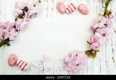 Easter greeting card with cherries blossom and eggs Stock Photo