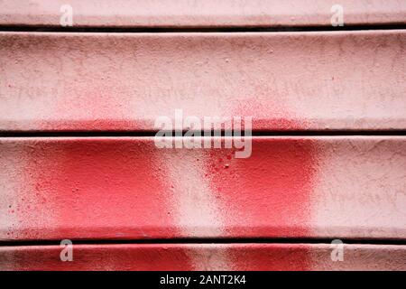 A metal wall of different red shades. Texture. Background. Stock Photo