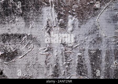 Black plaster with white lines from paint. Texture. Background. Stock Photo