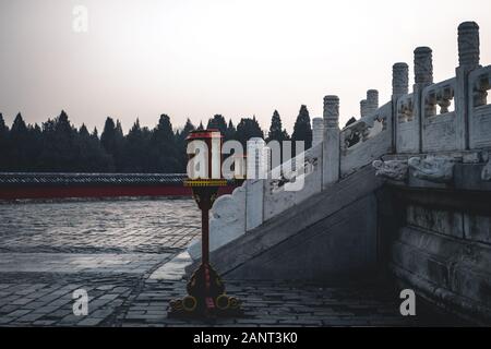 Detail of ornaments, a red chinese lamp and dragon heads, at The Temple of Heaven, an imperial complex of religious buildings situated in the southeas Stock Photo