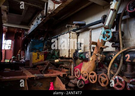 Old vessel engine room on a greek abandoned ship Stock Photo
