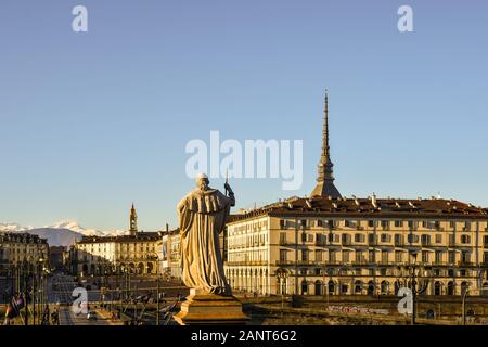 Cityscape of Turin with Vittorio Veneto Square, the top of Mole Antonelliana and the back of the statue of Vittorio Emanuele I, Piedmont, Italy Stock Photo