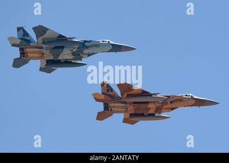 United States Air Force (USAF) McDonnell Douglas F-15C Eagles (78-0518 and 78-0503) from to the 65th Aggressor Squadron, 57th Wing based at Nellis Air Stock Photo