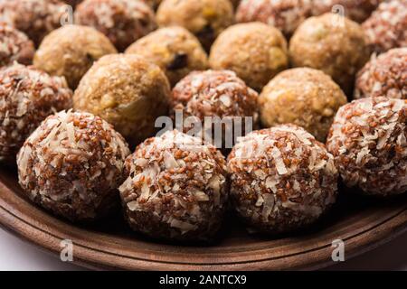 Group of Dink, Gond  , Aliv, Halim laddu, Laddoo, Ladu, Ladoo Made using Garden cress Seed and edible gum, sweet food Stock Photo