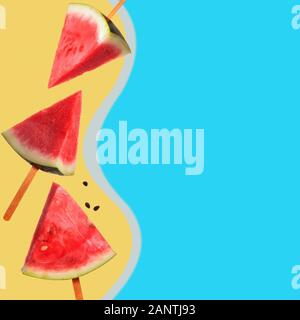 Slice of watermelon with splash of pink juice. Stock Photo