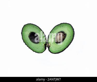 Fresh Cut Avocado With Heart Shaped Pit Area On Wooden Cutting Board  16444609 Stock Photo at Vecteezy